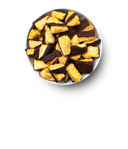 buah Frucht & Kakao Sorte gefriergetrocknete Ananas und Kakao in einer Schale