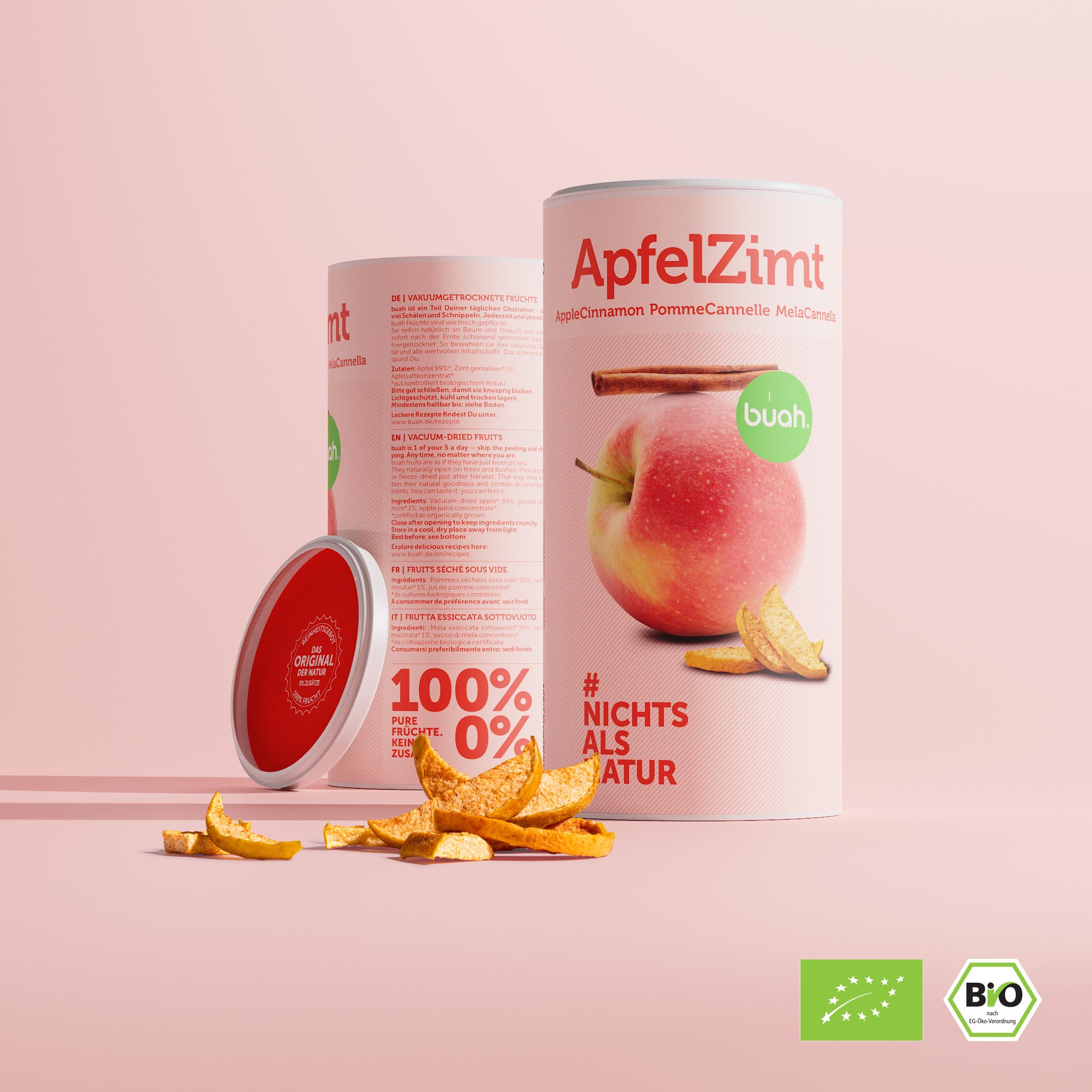 buah ApfelZimt Dose Ansicht von Vorne und Hinten, die nebeneinander stehen, Zylinder Papierdose, mit der Abbildung eines Apfel, auf dem eine Stange Zimt liegt, rosa Farbtoene