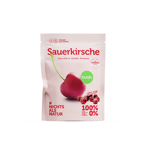 buah Sauerkirschen im Snackpack mit Sauerkirschen vor der Packung liegend