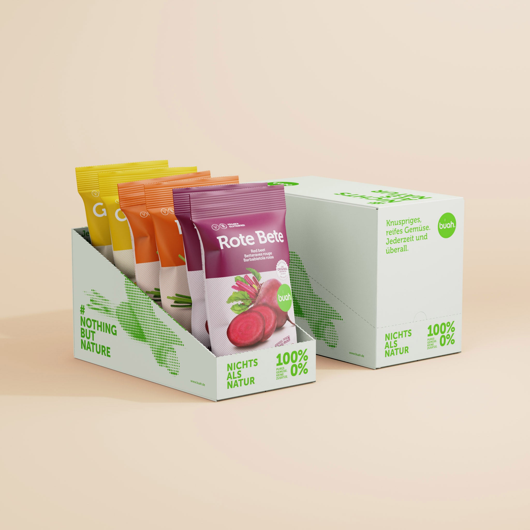 Verschiedene buah Gemuesechips hintereinander aufgestellt in einer weißen Papierbox von buah